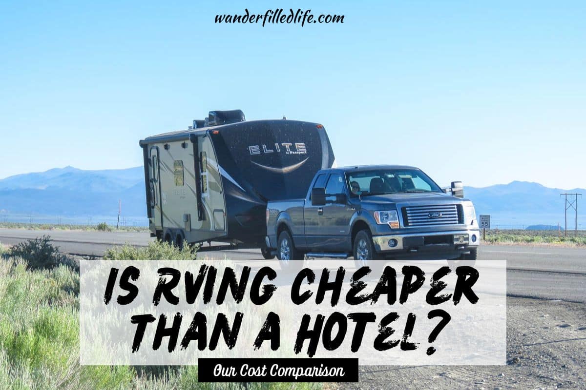Photo with text overlay. Picture shows a truck towing a camper on a road. Text reads Is RVing Cheaper Than a Hotel? Our Cost Comparison.