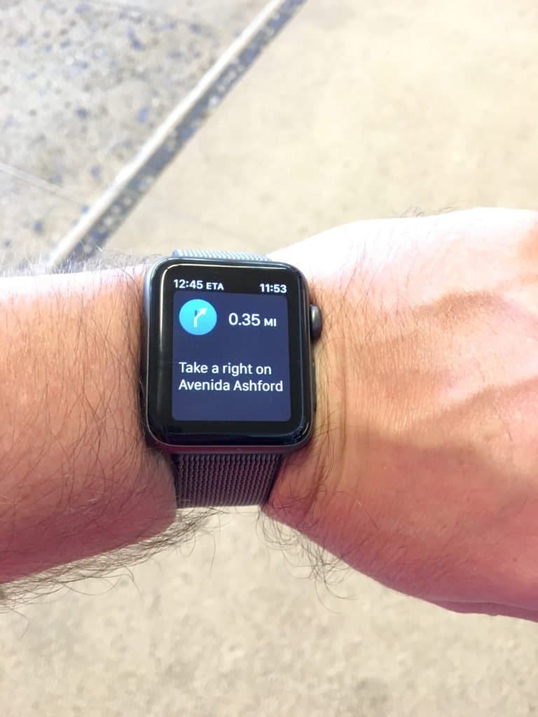 Grant using his Apple Watch for working directions.