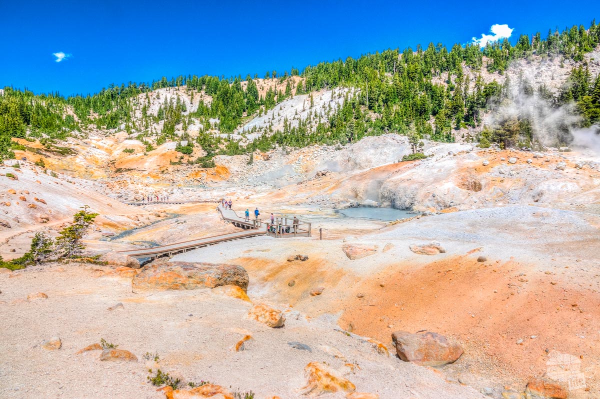 When it comes to what to see in Lassen Volcanic National Park, Bumpass Hell is the top of the list. This barren landscape has several vents, a turquoise pool and a boardwalk passing through the area.
