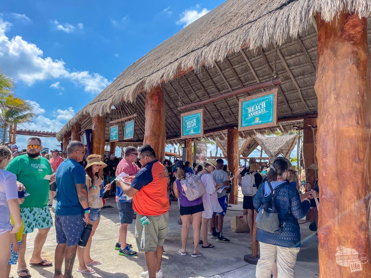 Lines of people waiting for a shore excursion in Costa Maya.