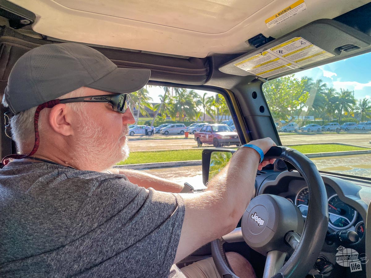 Grant driving a Jeep in Cozumel.