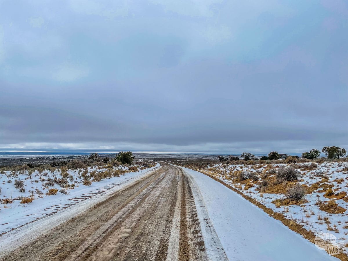A snow-covered dirt road.