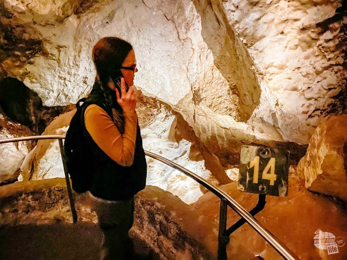 Bonnie listens to the audio tour of Carlsbad Caverns.