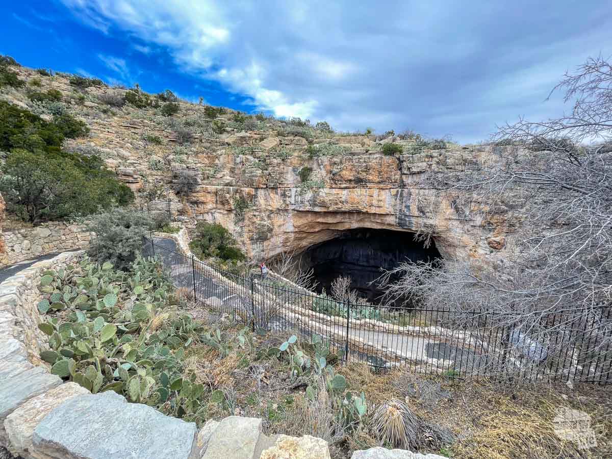 A large cave opening leading under ground.