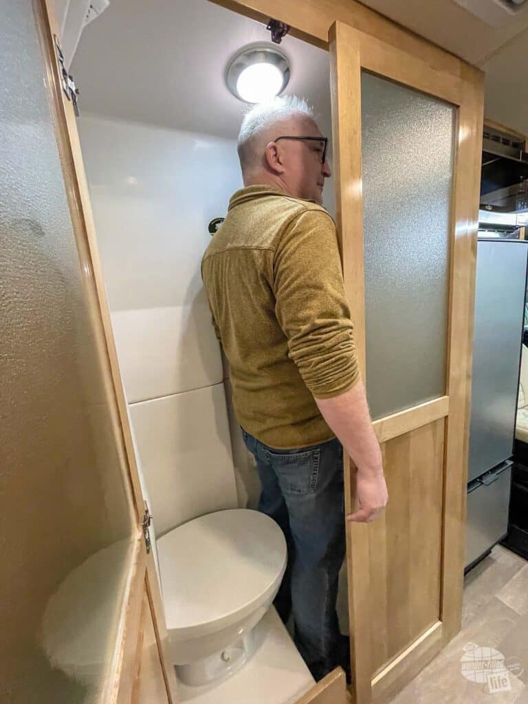 Grant does not fit inside this camper van's bathroom.