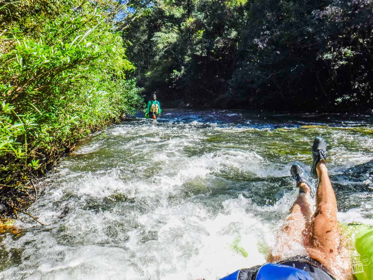 Going through one of the "rapids" on the river in Belize.