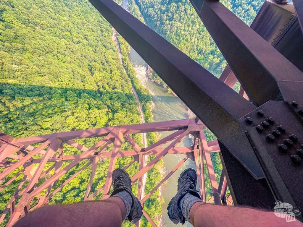 Grant dangling his feet over the edge at New River Gorge.