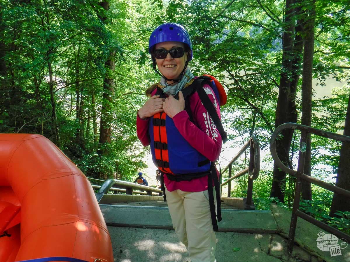 Bonnie wearing all of the gear for a day of New River Gorge Adventure