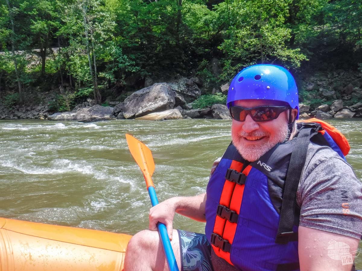 Grant rafting down the New River.
