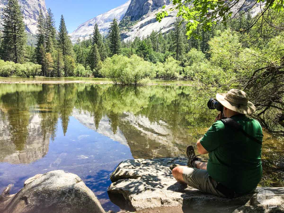 Grant taking a picture at Mirror Lake in Yosemite National Park with a Canon EOS 7d MkII.