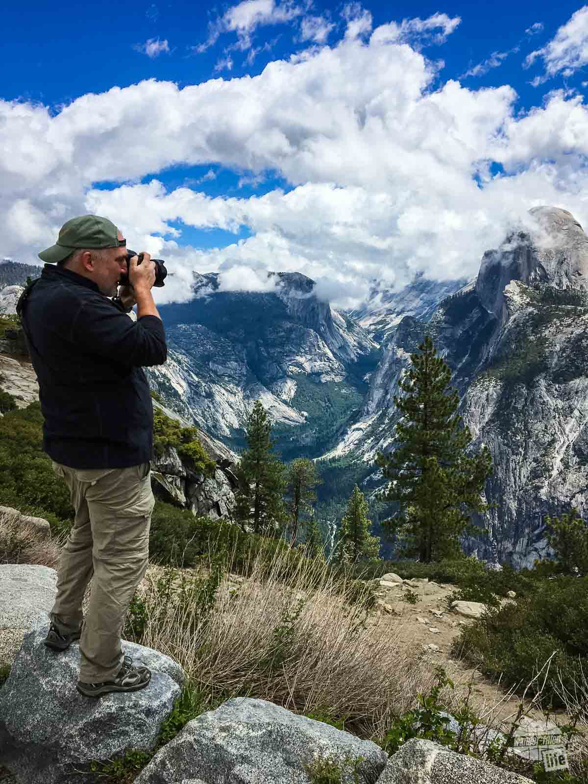 Grant taking a picture in Yosemite National Park.