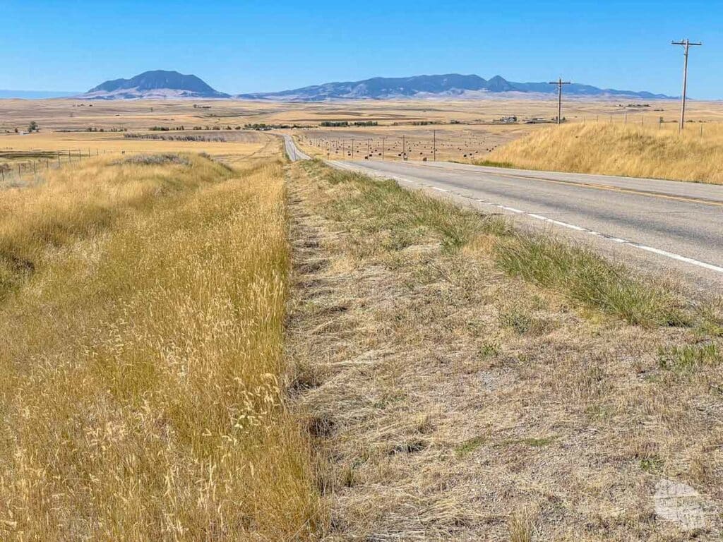 A winding two lane road in eastern Montana