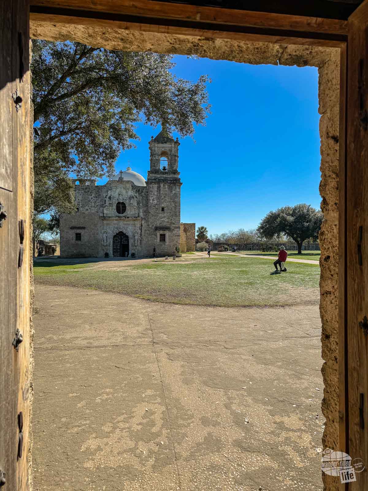Looking at the front facade of Mission San José in San Antonio Missions National Historical Park.