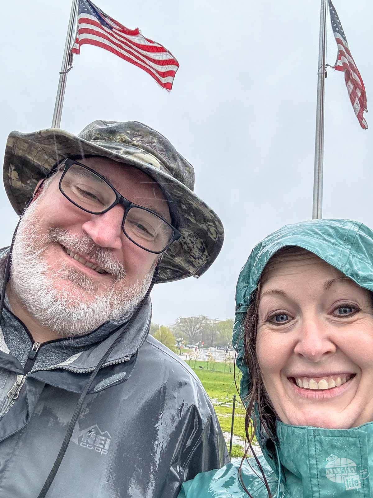 Grant and Bonnie in the pouring rain at the Washington Monument