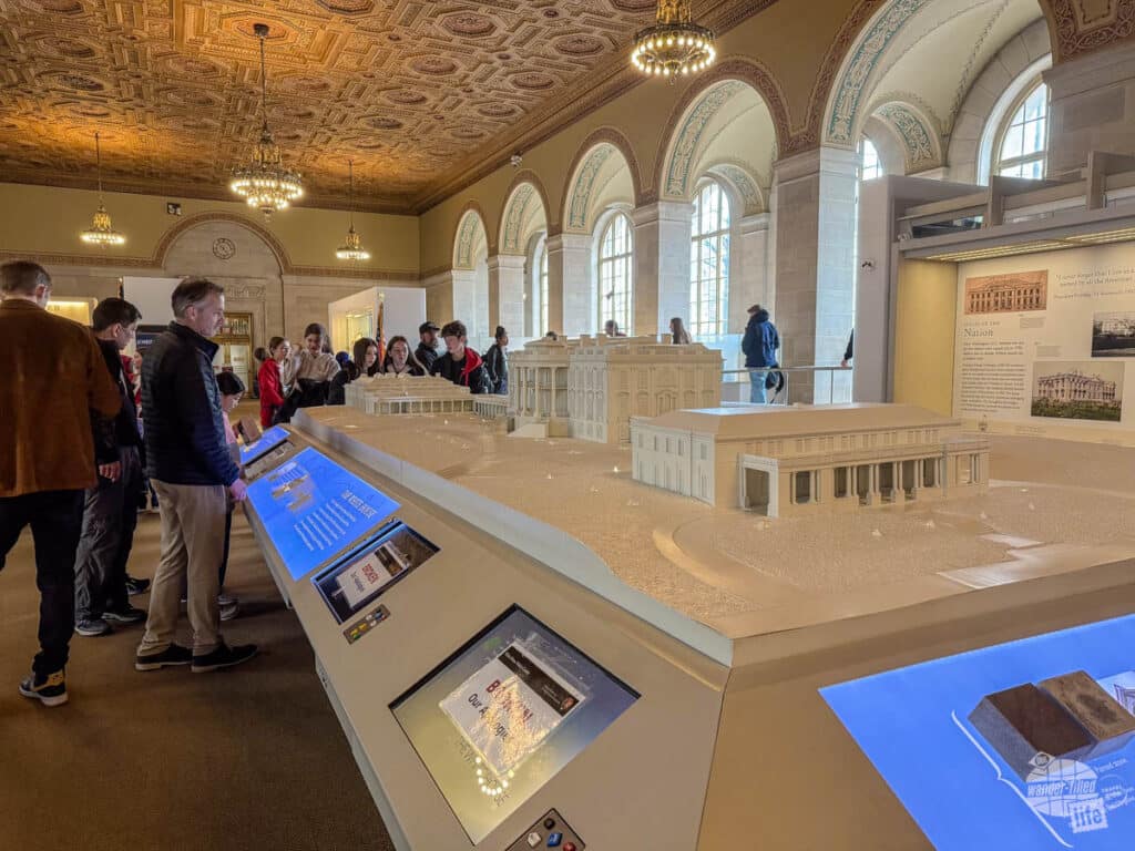 An exhibit on the White House with a scale model of all the buildings of the White House and what they are used for.