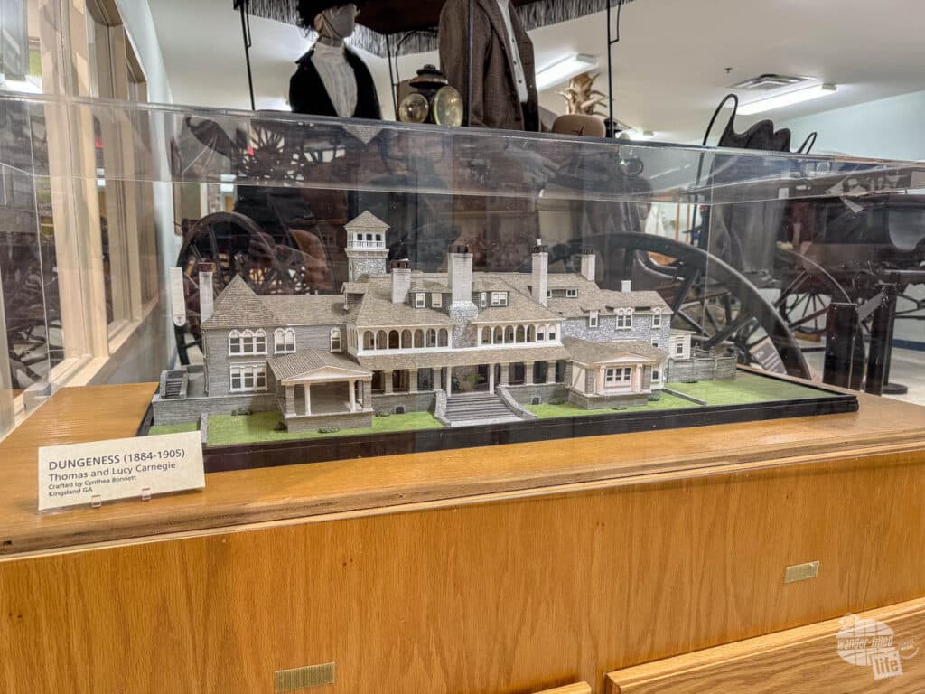 A model under glass of a mansion